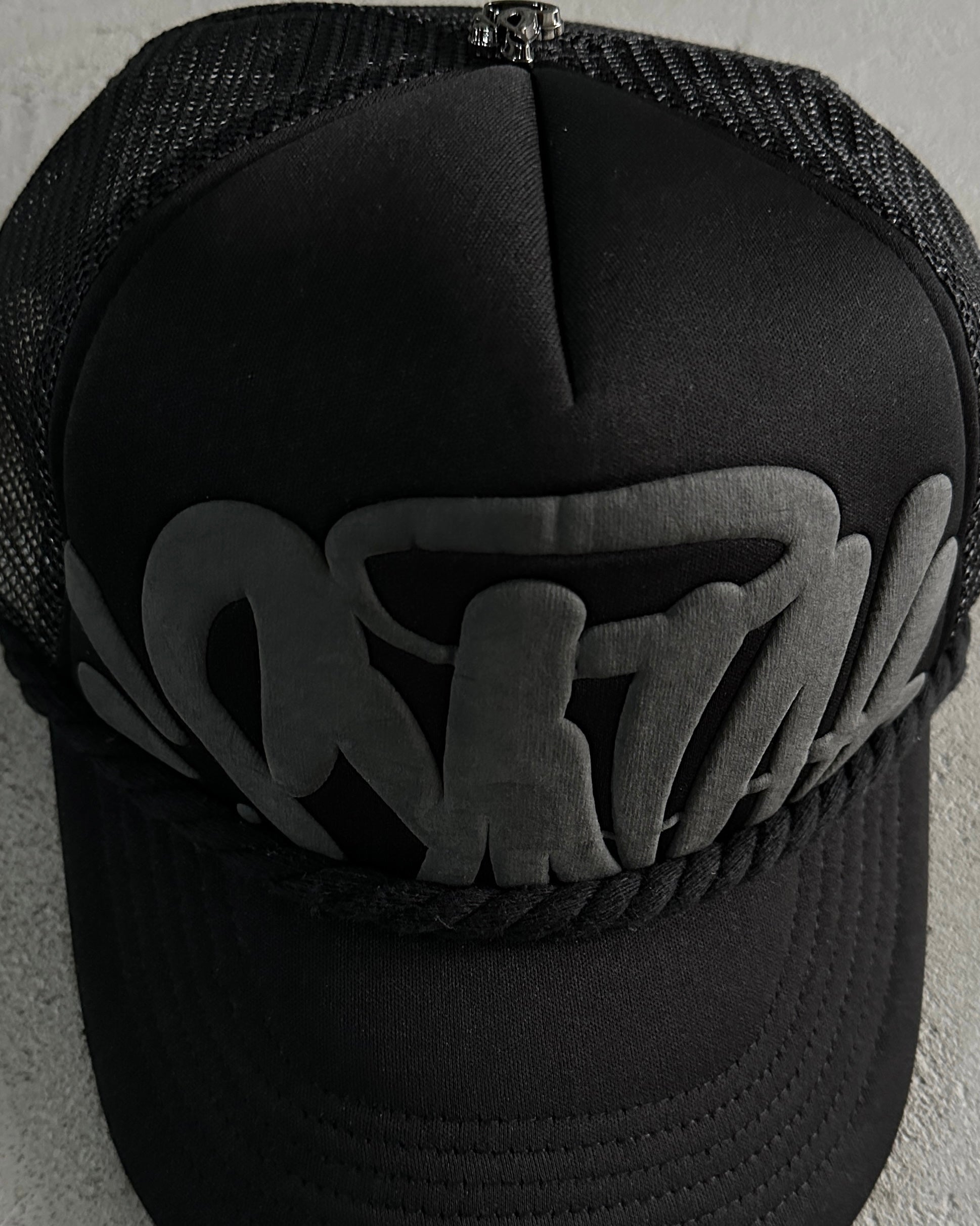 Syna World Rope Trucker Hat – BLACK