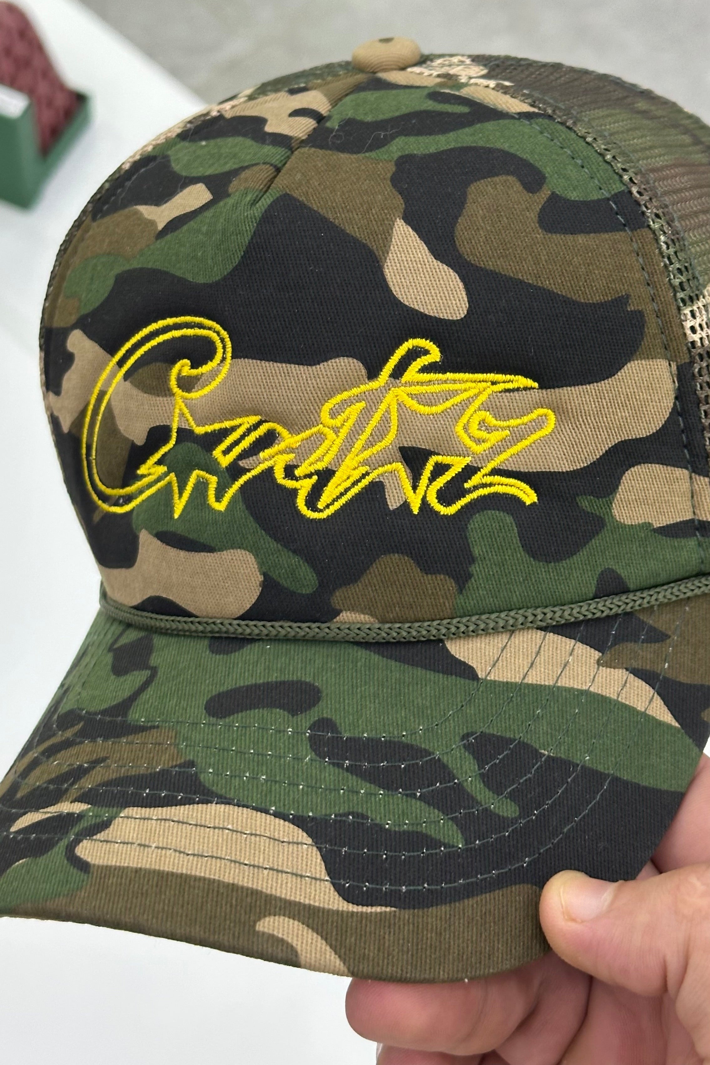 CORTEIZ 5 STARZ Alcatraz Trucker Hat – Camo Yellow