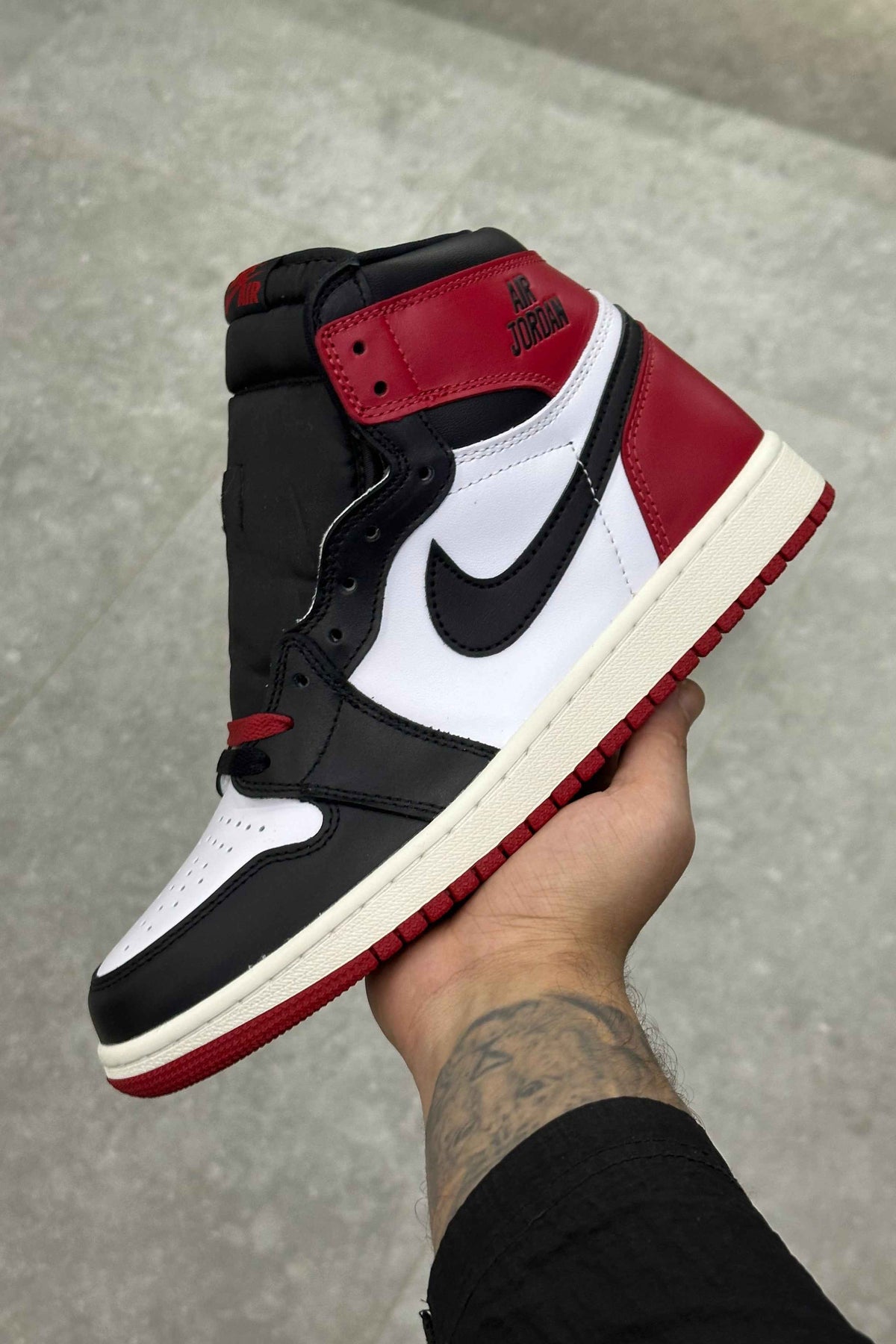 Jordan 1 Retro High OG - Black Toe Reimagined