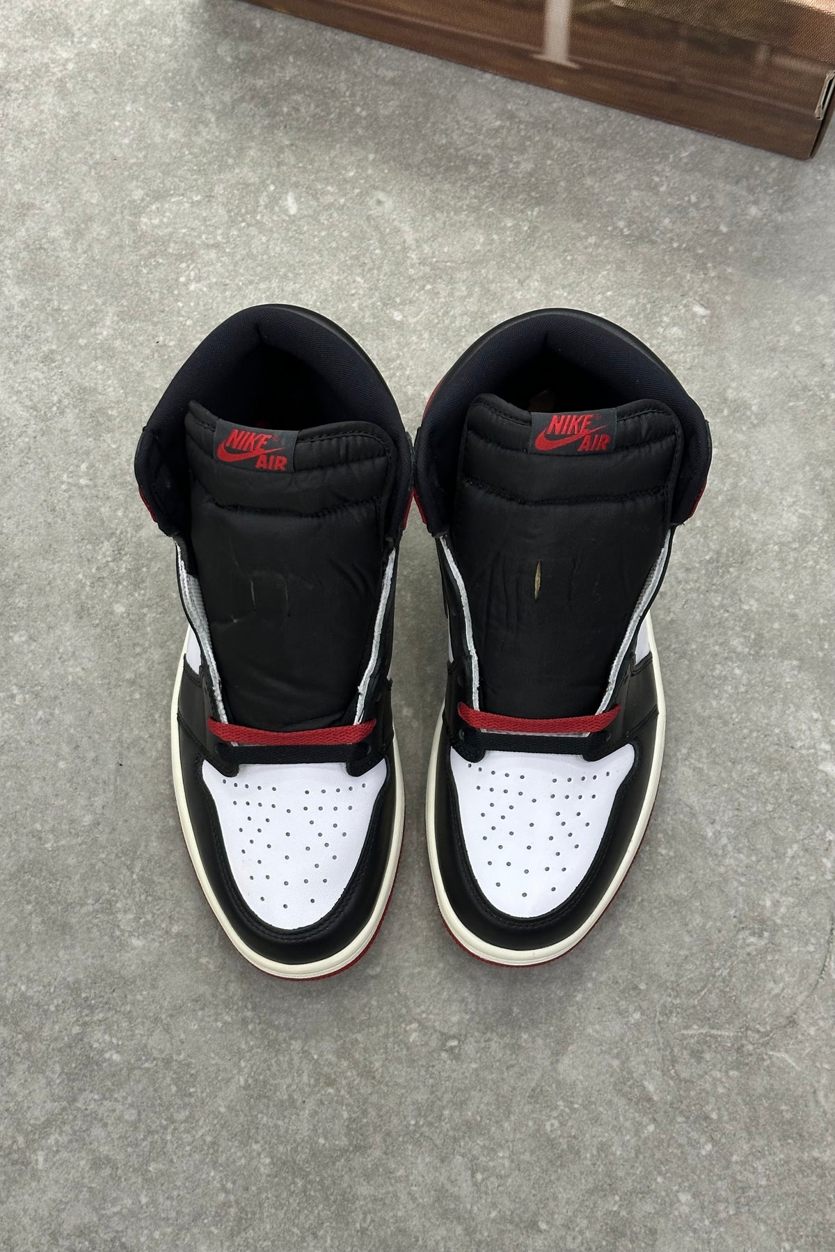 Jordan 1 Retro High OG - Black Toe Reimagined