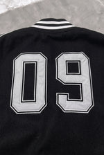 BALENCIAGA Political Campaign Varsity Jacket in Wool and Leather – Black – back 09 close-up
