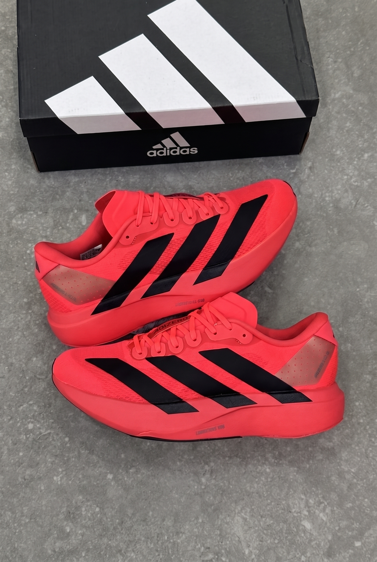 Adidas Adizero Adios Pro 3 Solar Red pair with black adidas box