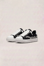 NUMERIS Low-Top Sneakers Black Pearl Studded - pair, front three-quarter view