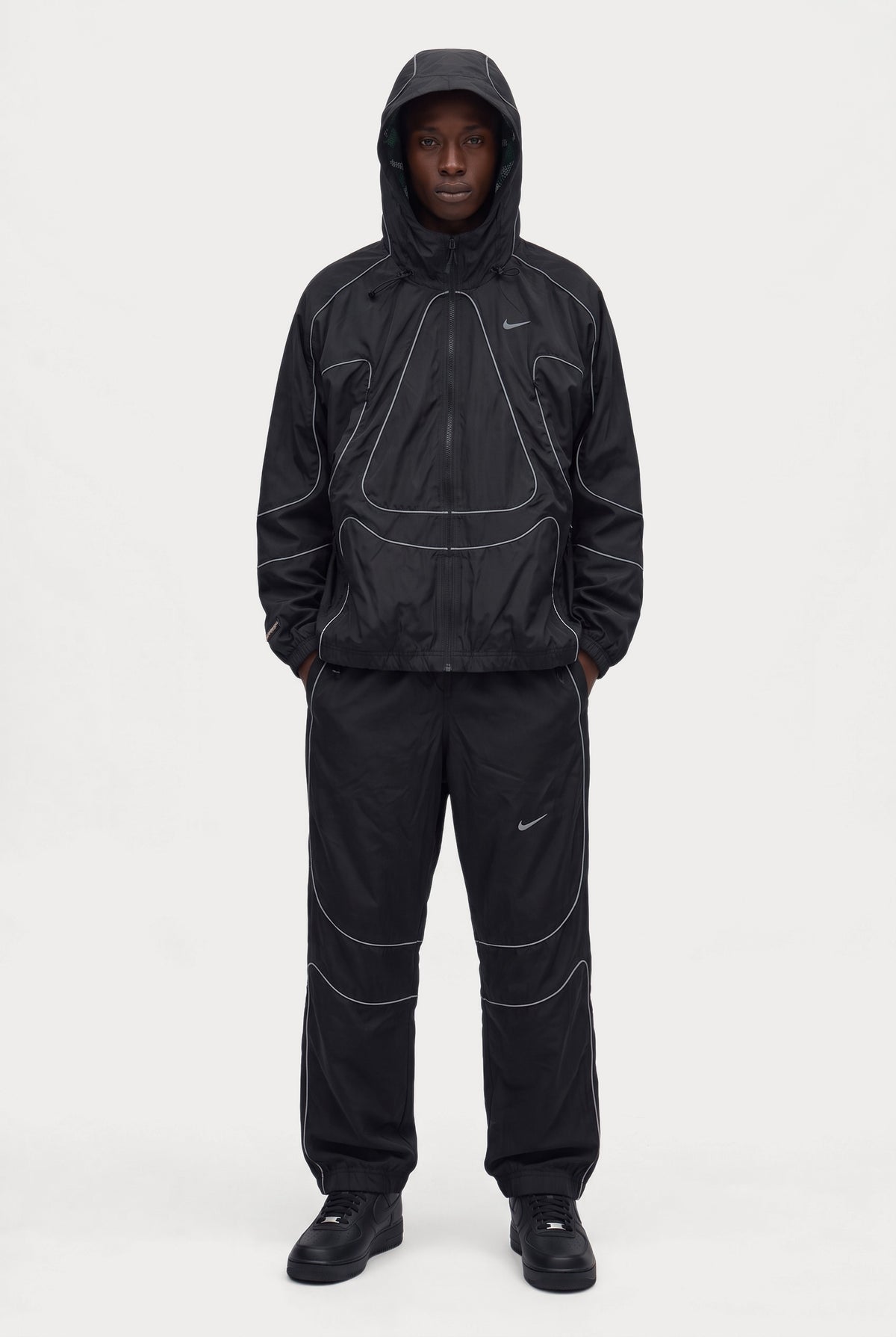 Corteiz x Nike NRG Onyx Tracksuit - Black, worn on model