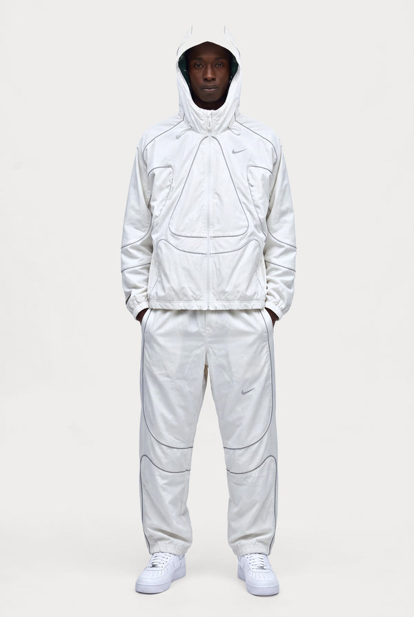 Corteiz x Nike NRG Onyx Tracksuit - White, worn on model