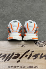 Pharrell Williams x Adidas Adistar Jellyfish – Focus Olive/Core Black/Orange – heels on the box