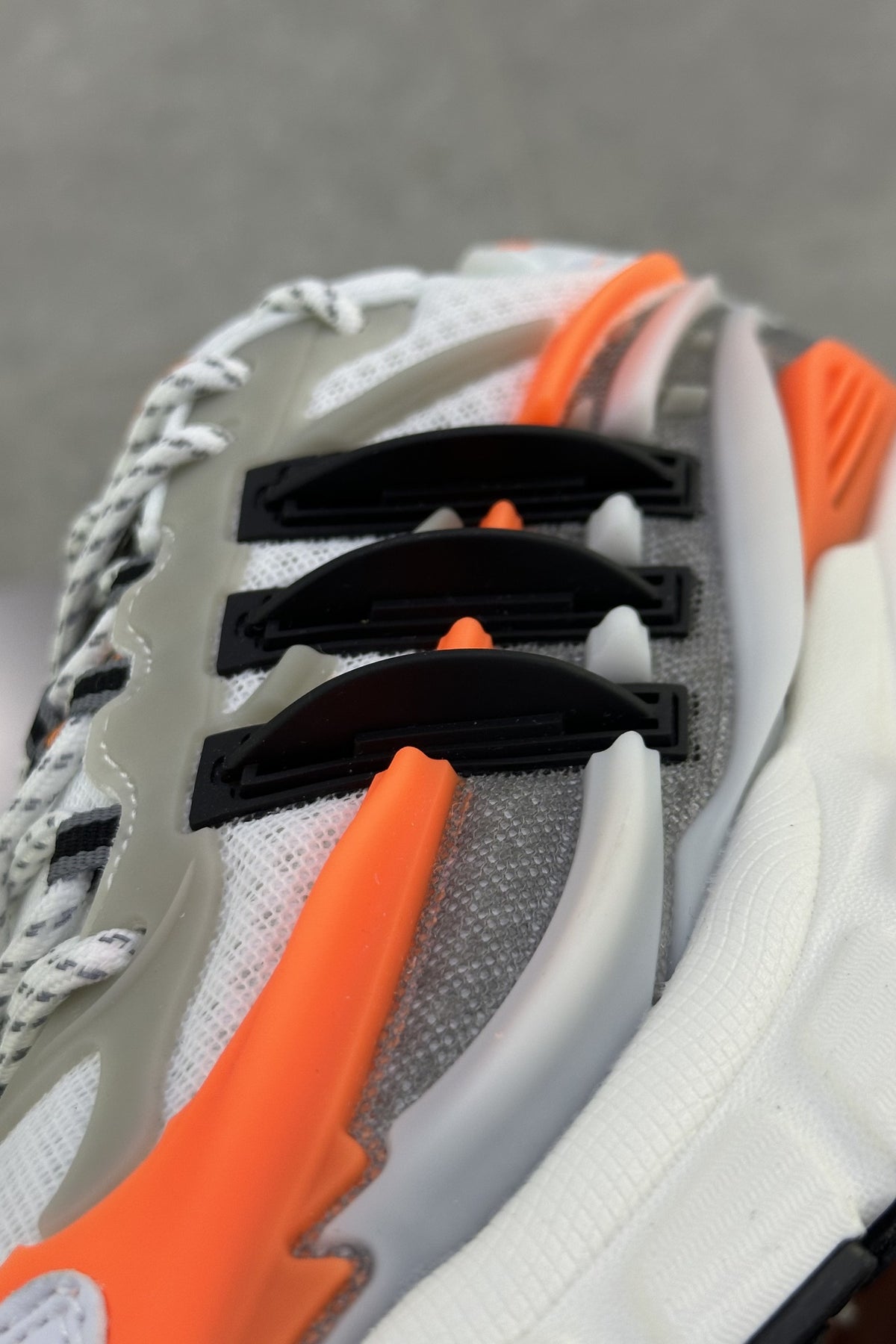 Pharrell Williams x Adidas Adistar Jellyfish – Focus Olive/Core Black/Orange – black stripes close-up