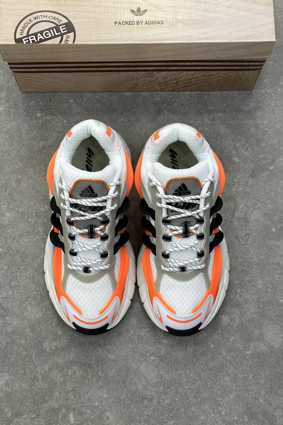 Pharrell Williams x Adidas Adistar Jellyfish – Focus Olive/Core Black/Orange – front view