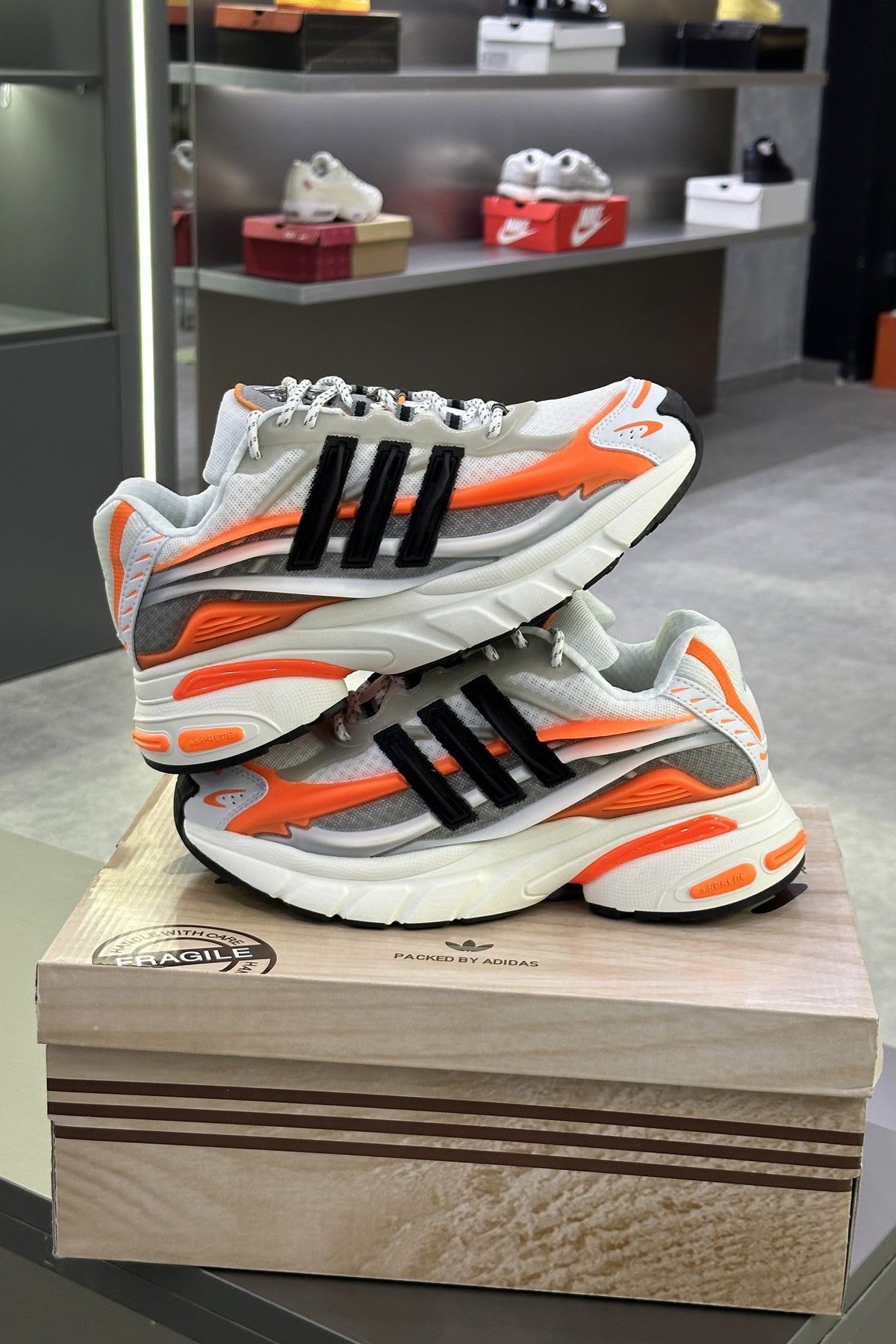 Pharrell Williams x Adidas Adistar Jellyfish – Focus Olive/Core Black/Orange – pair on the box in store