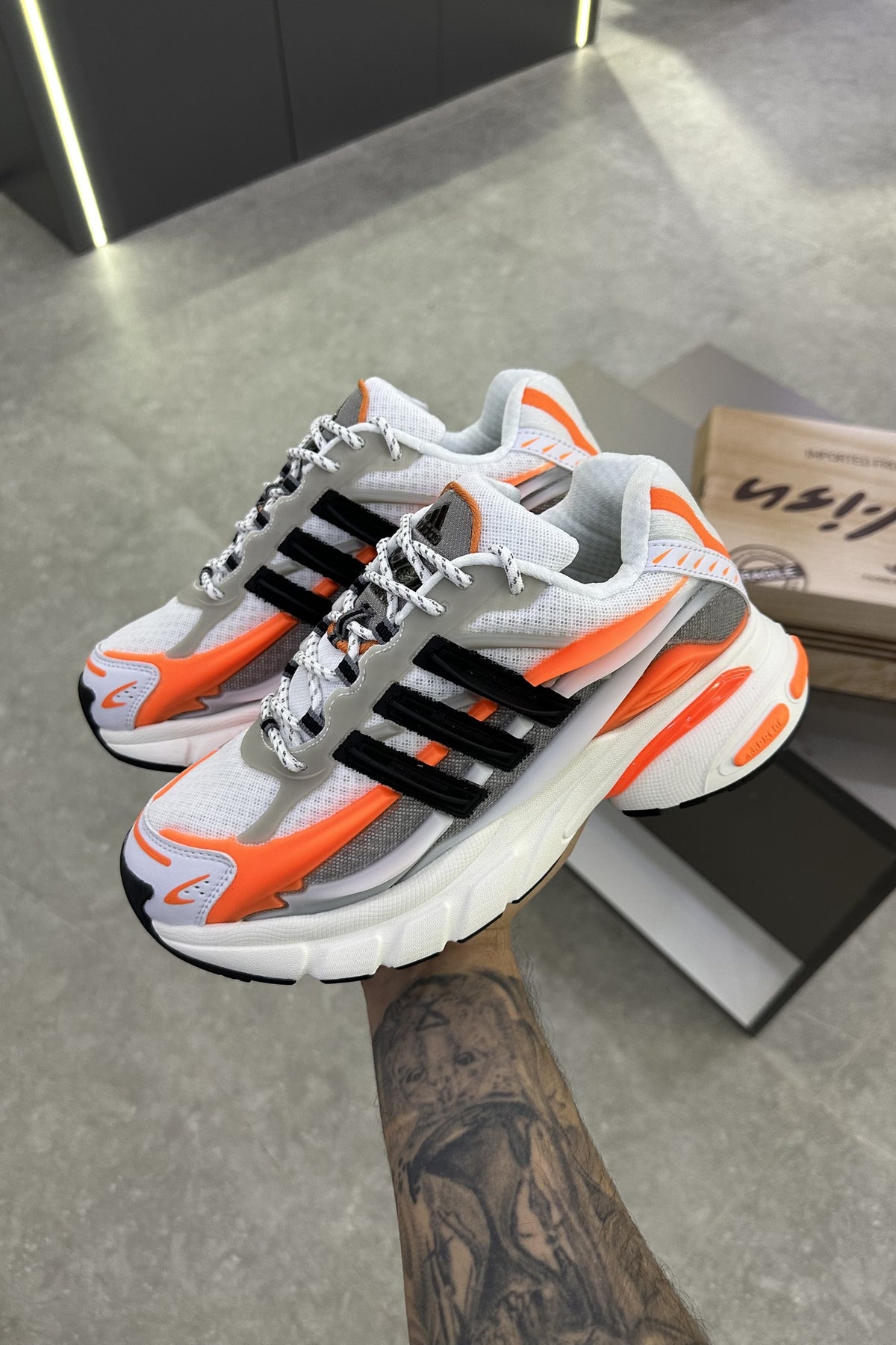 Pharrell Williams x Adidas Adistar Jellyfish – Focus Olive/Core Black/Orange – pair in hand