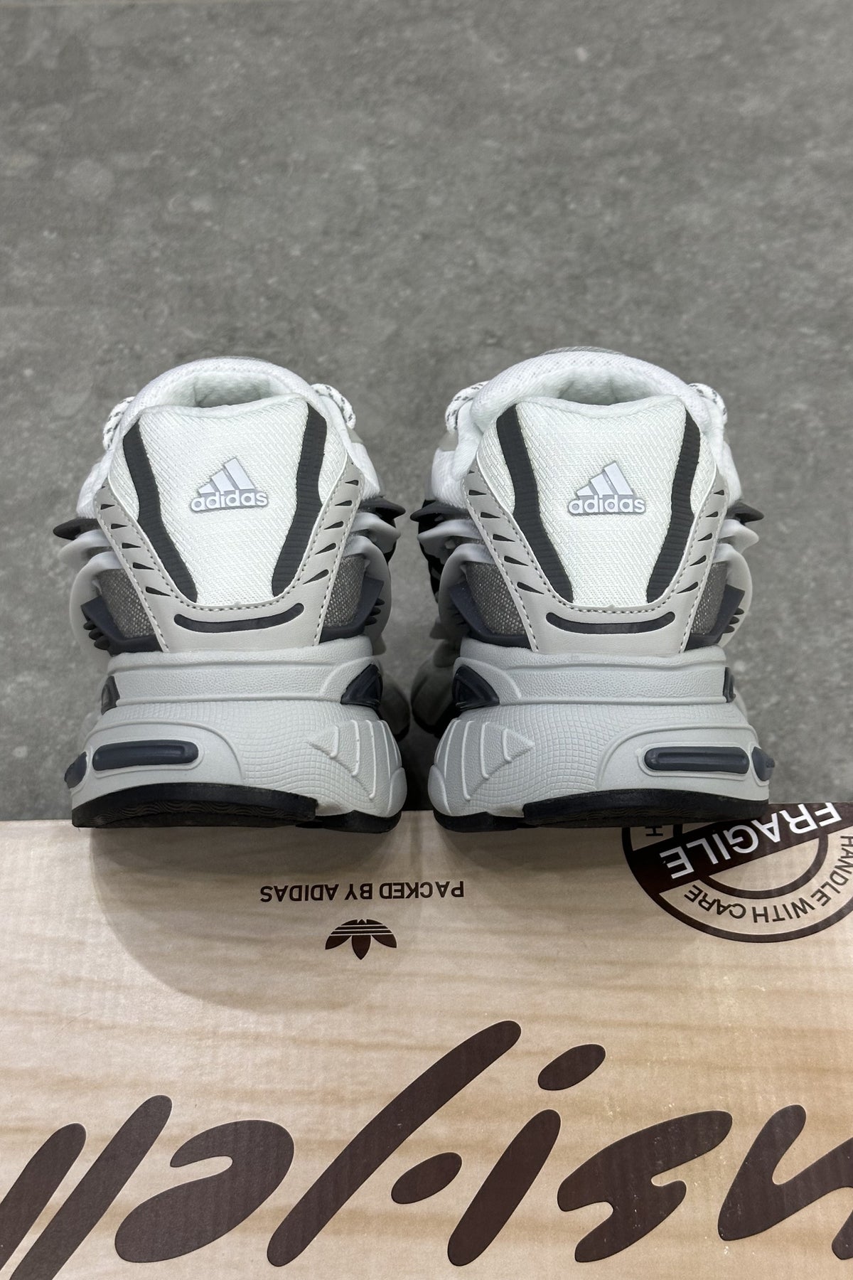 Pharrell Williams x Adidas Adistar Jellyfish – Solid Grey/Core Black/Clear Onix – heels on the box