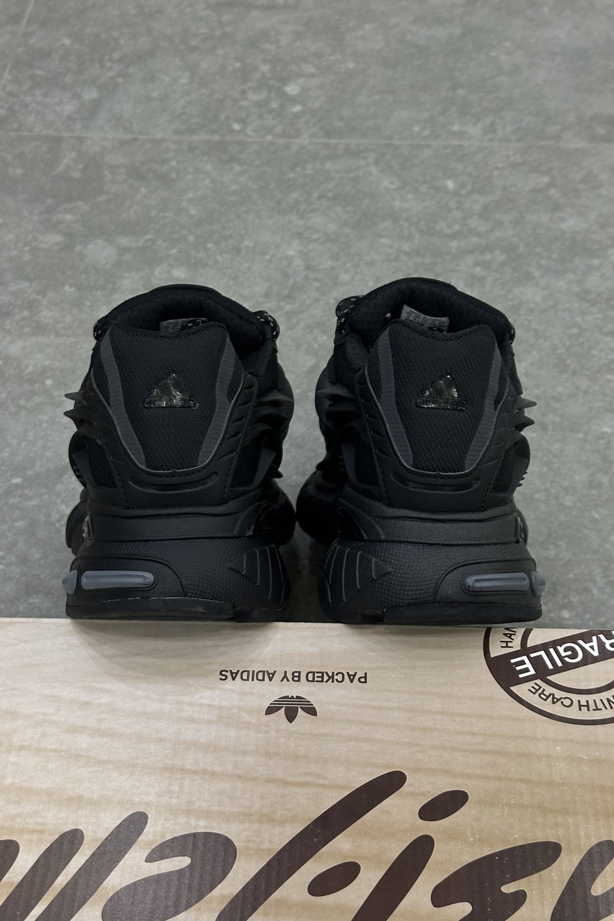 Pharrell Williams x Adidas Adistar Jellyfish – Triple Black – heels on the box